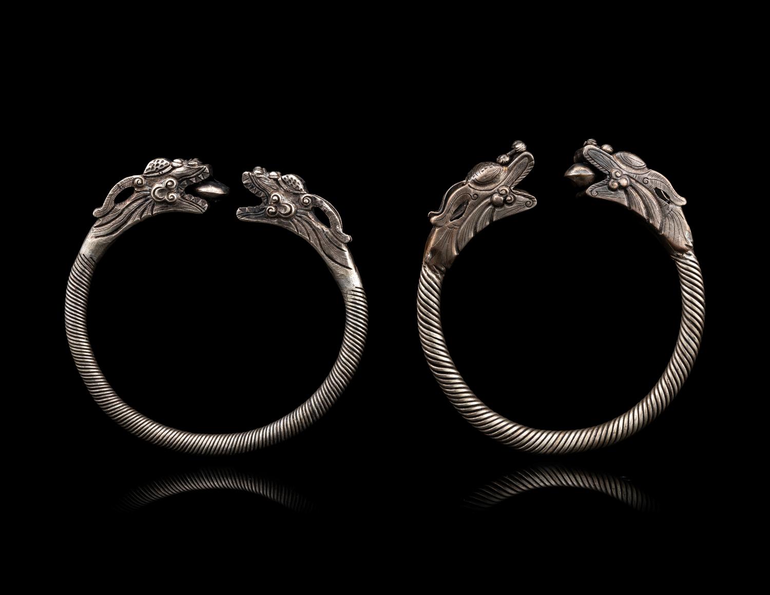 A Pair of Chinese Silver 'Dragon' Bangles