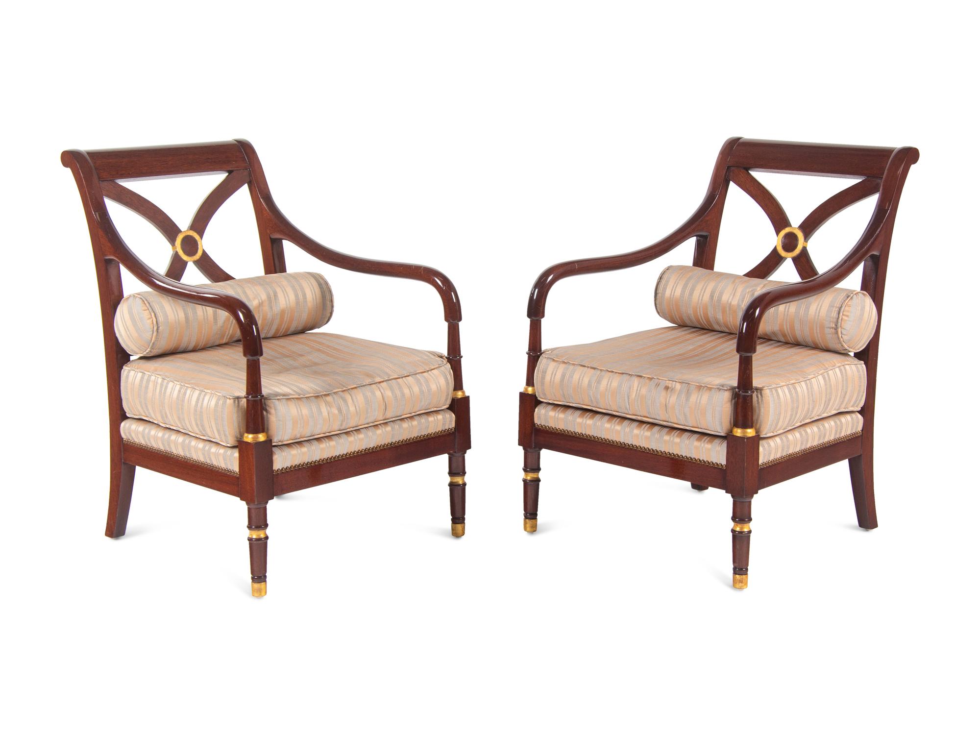A Pair of Regency Style Parcel Gilt Armchairs