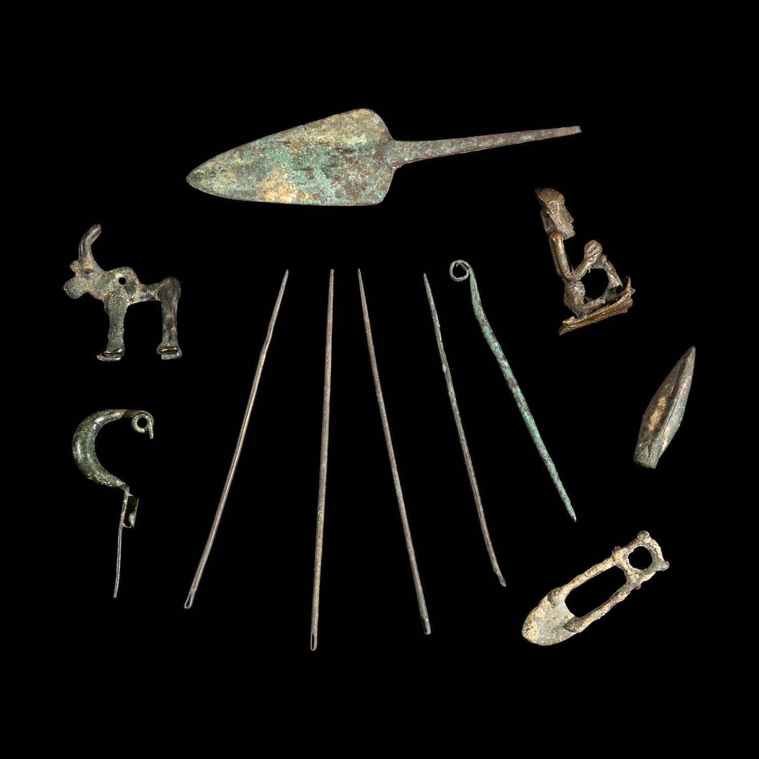 Eleven Luristan Bronze Figures and Implements