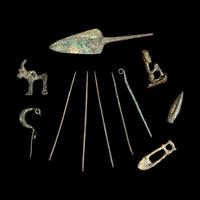 Eleven Luristan Bronze Figures and Implements