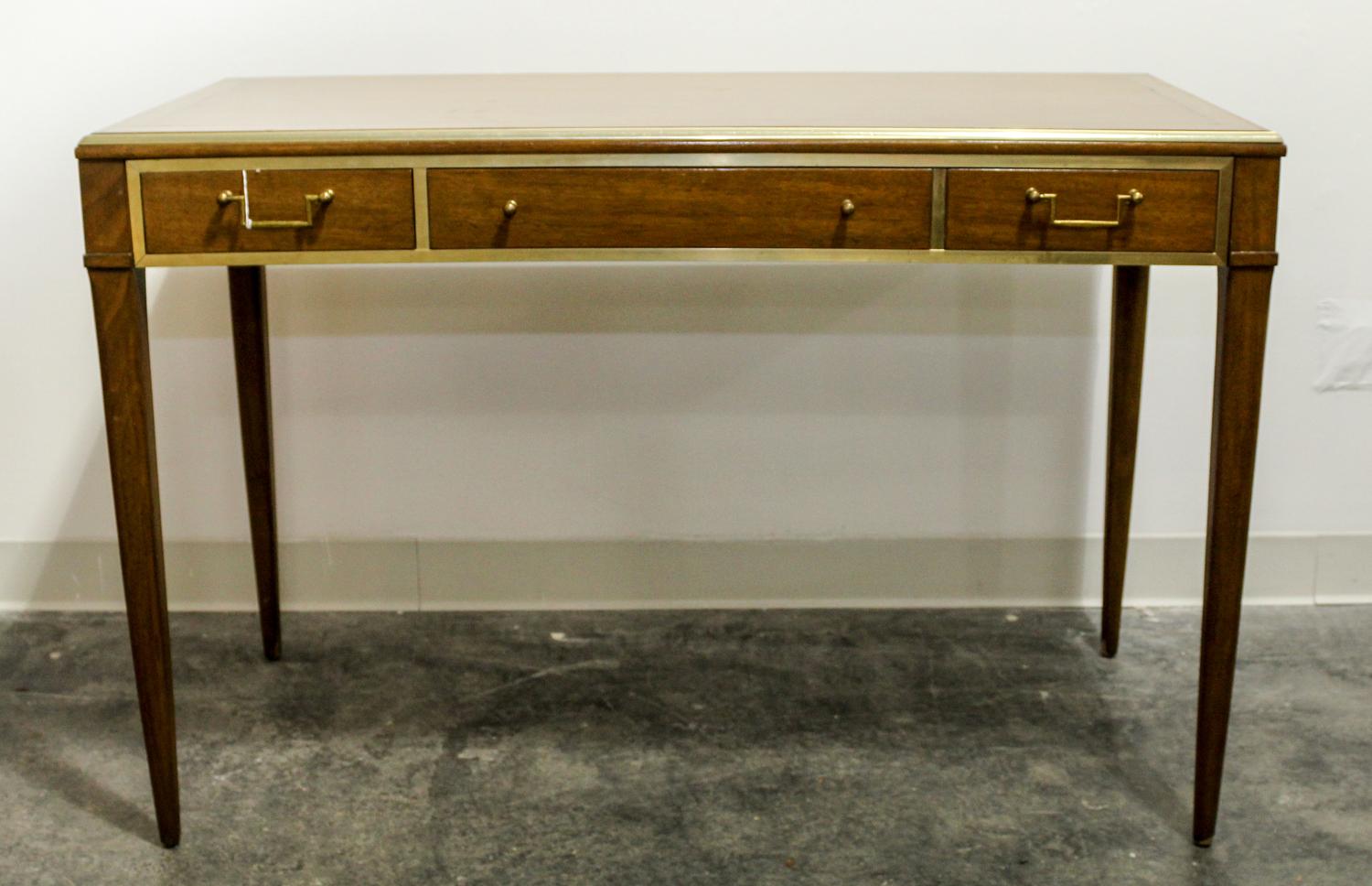 A Brass Inlaid Wood Desk Height 29 x width 43 1/2 x depth 20 inches.