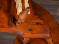 A D.R. Dimes Turned and Volute Carved Tiger Maple Windsor Three-Back Writing Armchair