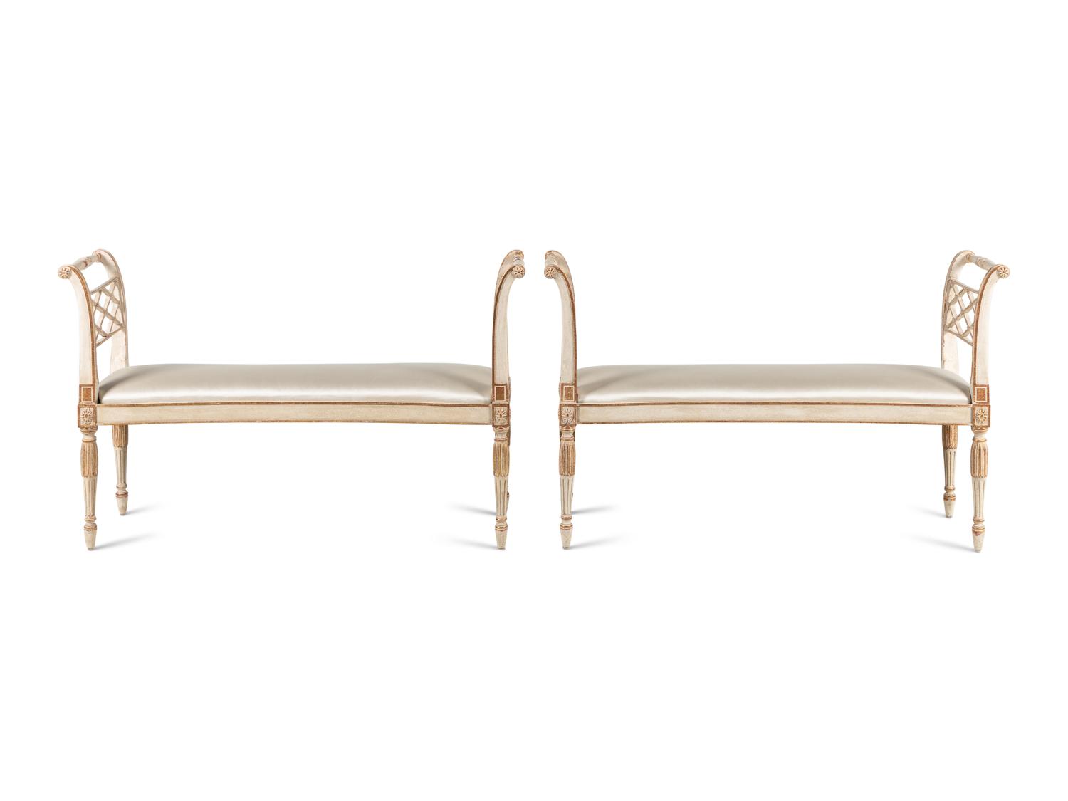 A Pair of George III Style Painted and Parcel-Gilt Window Benches