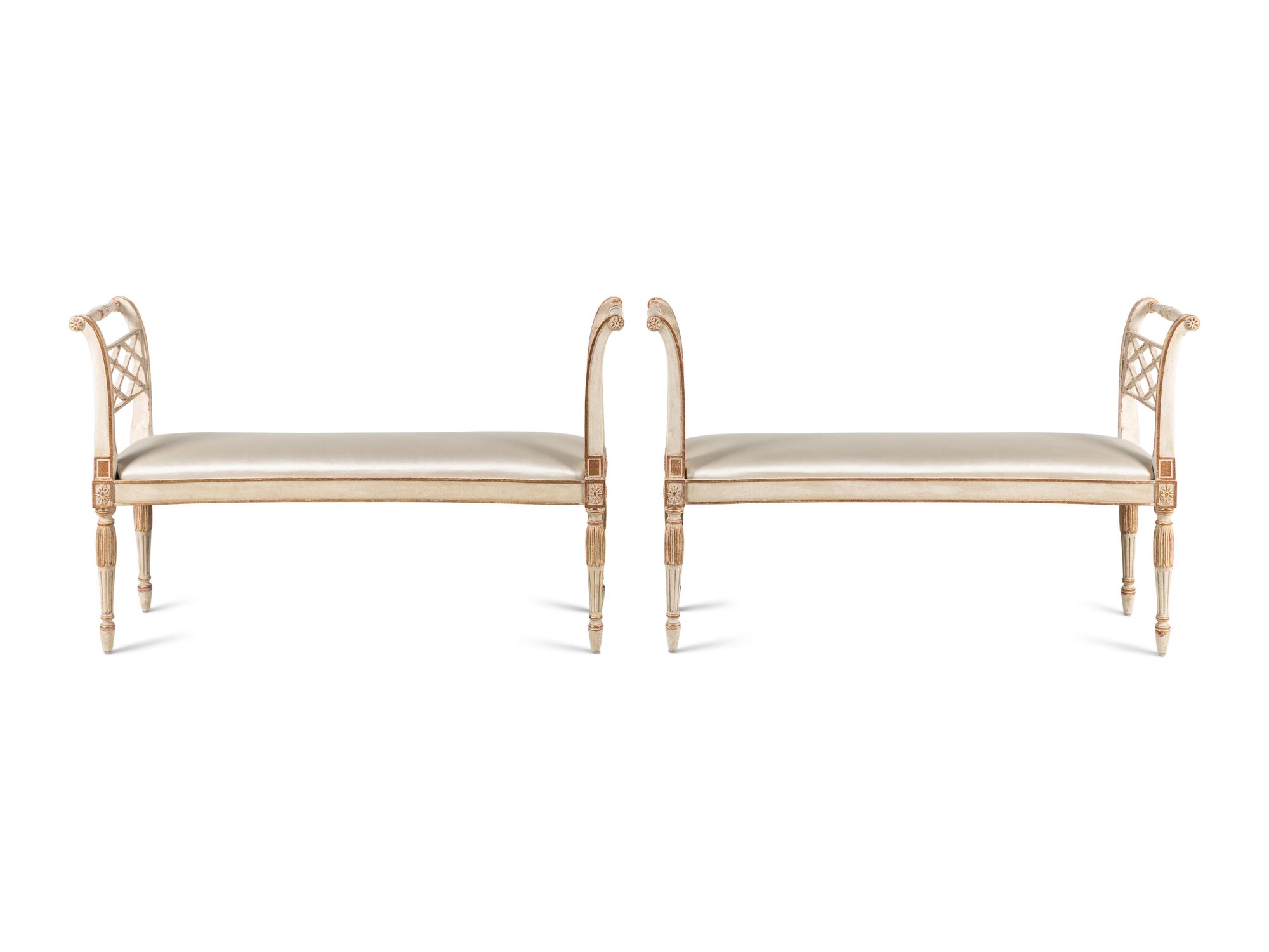 A Pair of George III Style Painted and Parcel-Gilt Window Benches