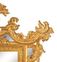 An Italian Baroque Style Giltwood Mirror