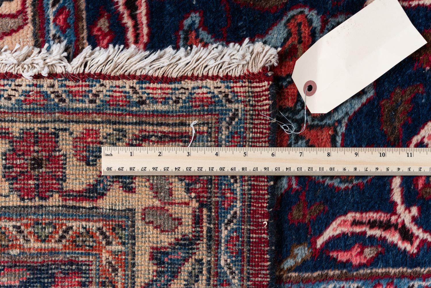 A Tabriz Wool Rug