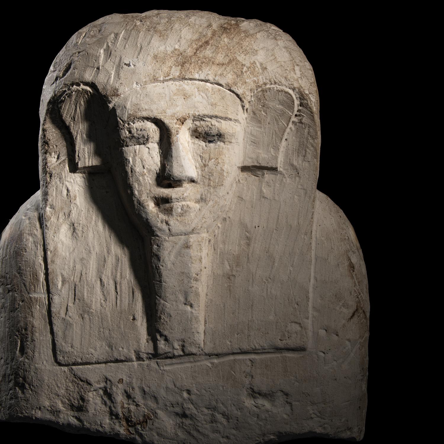An Egyptian Limestone Sarcophagus Lid