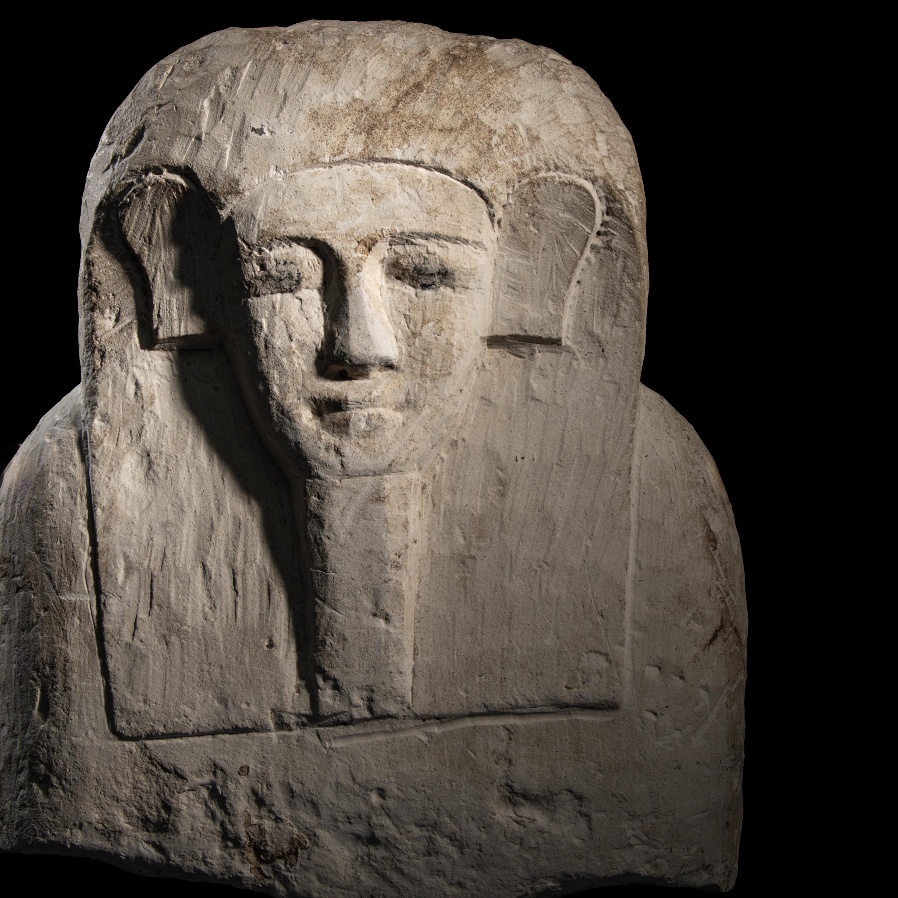 An Egyptian Limestone Sarcophagus Lid