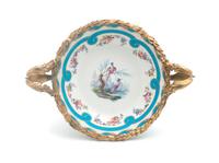 A Sevres Gilt Bronze Mounted Center Bowl Width over handles 14 1/4 inches. — 19TH CENTURY