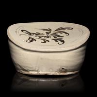 A Chinese Cizhou Slip-Decorated Pillow, Song Dynasty — 宋 磁州窯萱草紋枕