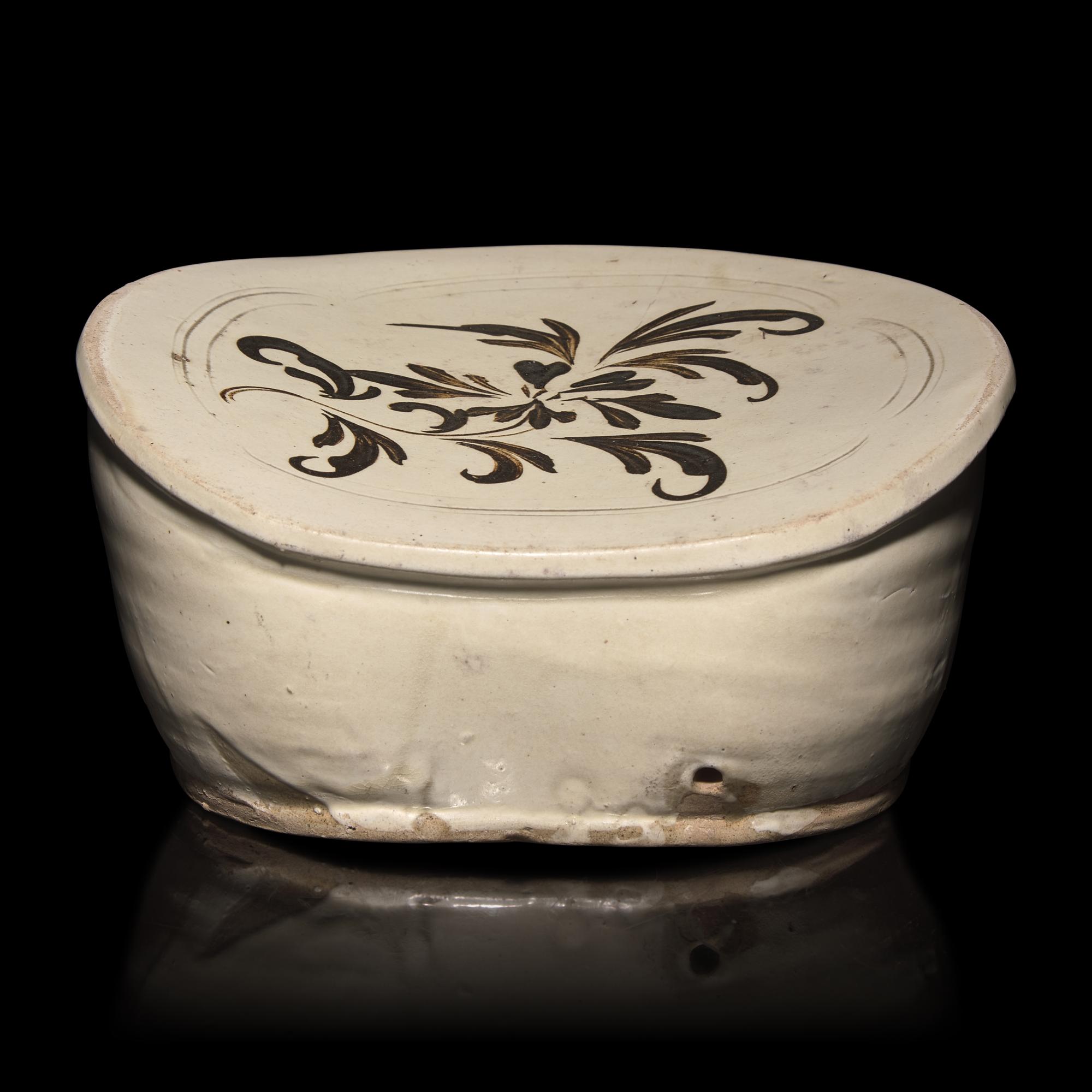 A Chinese Cizhou Slip-Decorated Pillow, Song Dynasty — 宋 磁州窯萱草紋枕