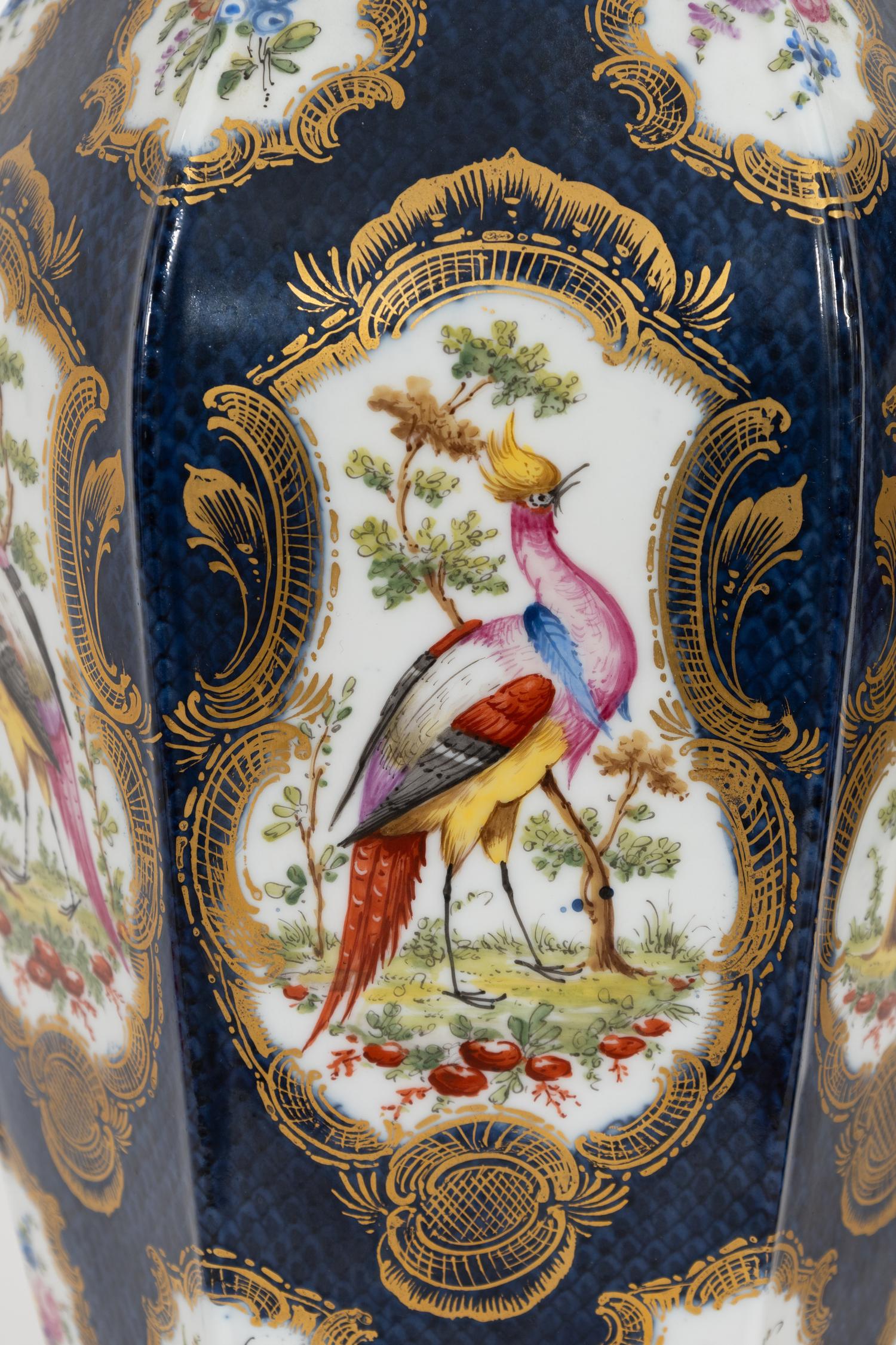 A Pair of Worcester Cobalt Ground Parcel Gilt Porcelain Urns