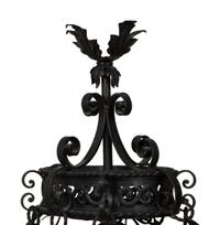 A Wrought Iron Chandelier in the Style of Addison Mizner — 20th Century