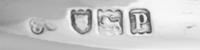 A Set of Twelve English Silver Plates , Elkington & Co., London, 1910 , each having pierced foliate scroll borders.