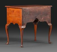 A Queen Anne Carved and Figured Walnut Dressing Table