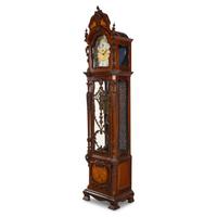 An English Carved Walnut Tall Case Clock