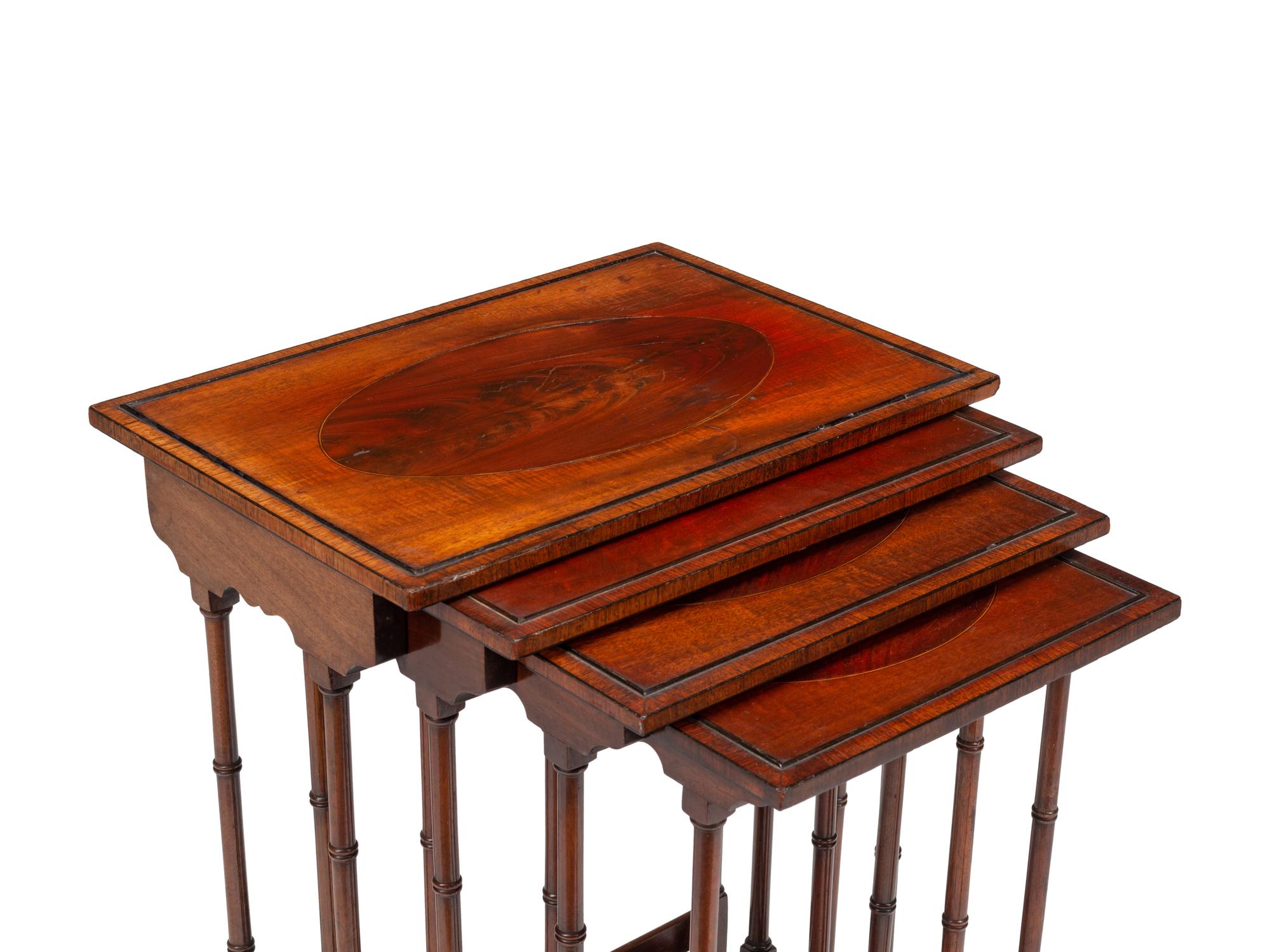 A Set of Four Edwardian Mahogany Nesting Tables