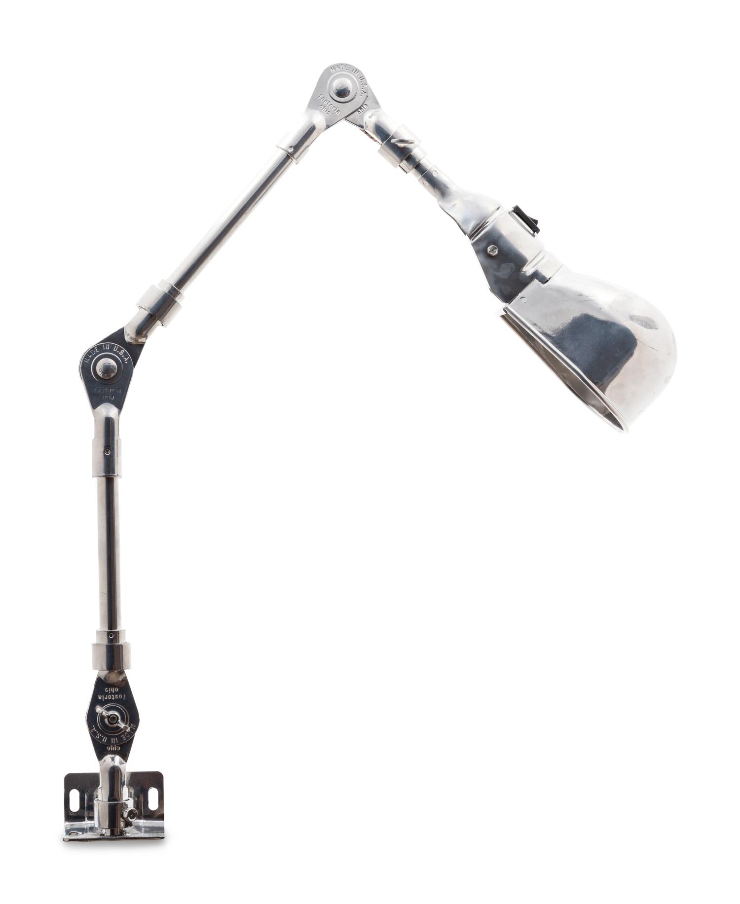 A Chromed Metal Articulated Table Lamp