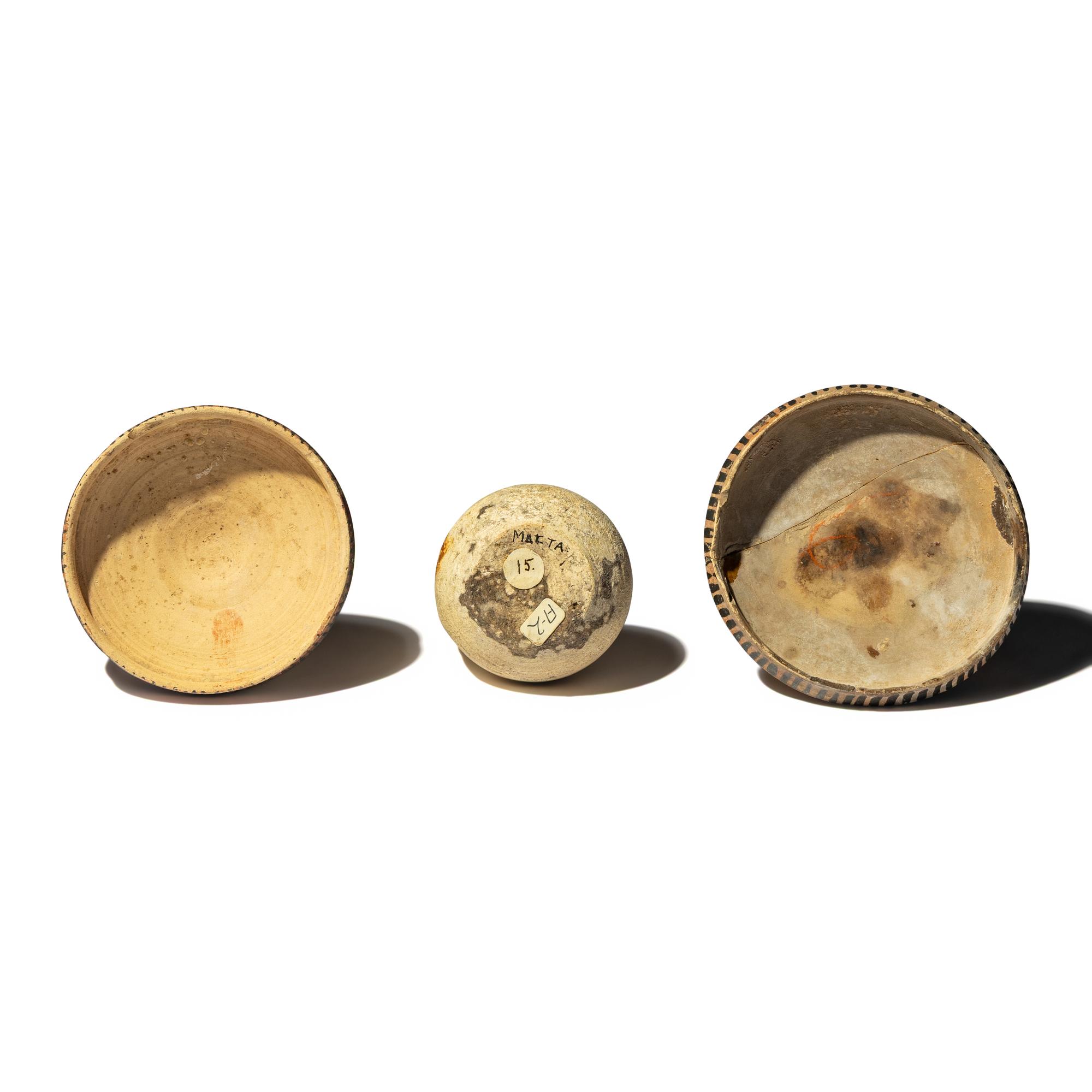 Fifteen Greco-Roman Terracotta Lids and Two Vessels
