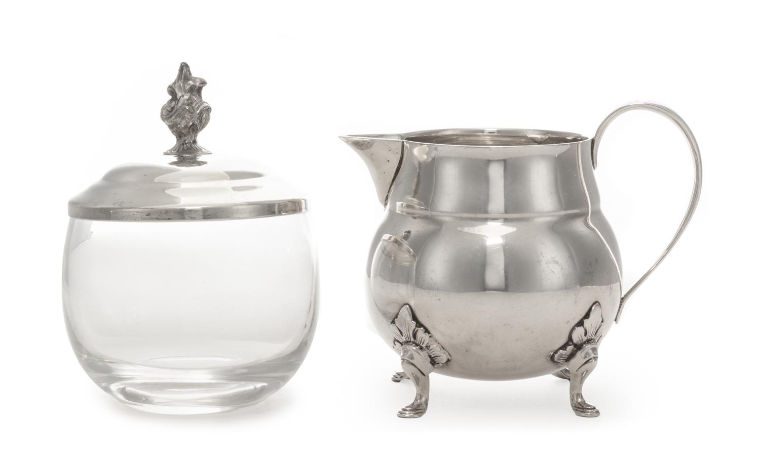 An American Silver Creamer, J. Wagner & Son, New York, NY, of handled form and raised on four pad feet, together with a silver-plate mo