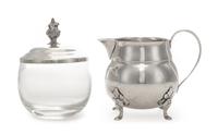 An American Silver Creamer, J. Wagner & Son, New York, NY, of handled form and raised on four pad feet, together with a silver-plate mo