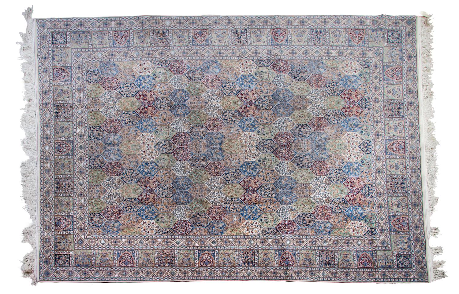 A Tabriz Wool Rug, 11 feet 4 inches x 8 feet 9 inches.