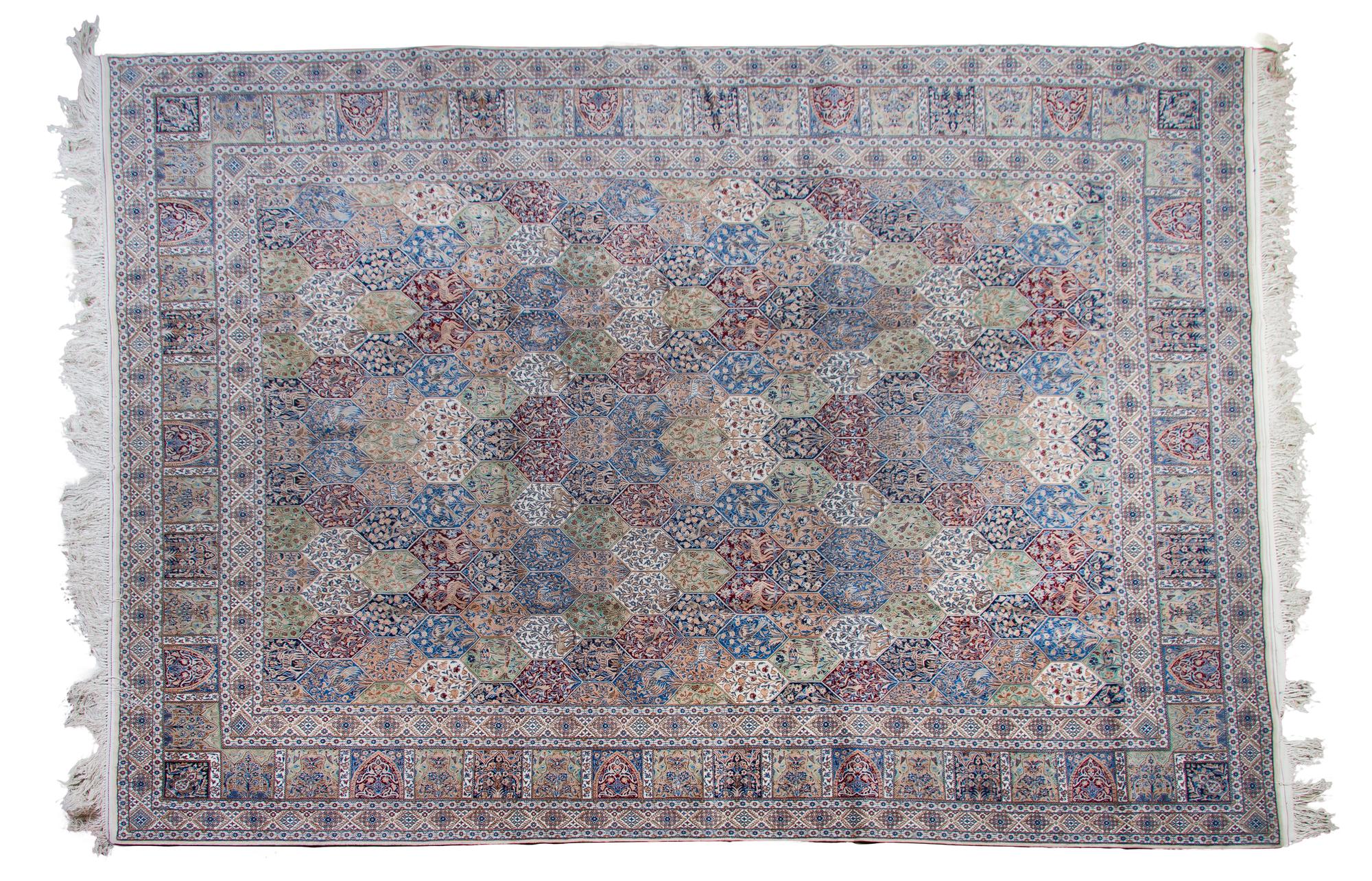 A Tabriz Wool Rug, 11 feet 4 inches x 8 feet 9 inches.