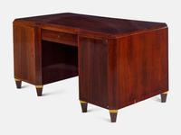 An Art Deco Lacquered Walnut and Brass Desk