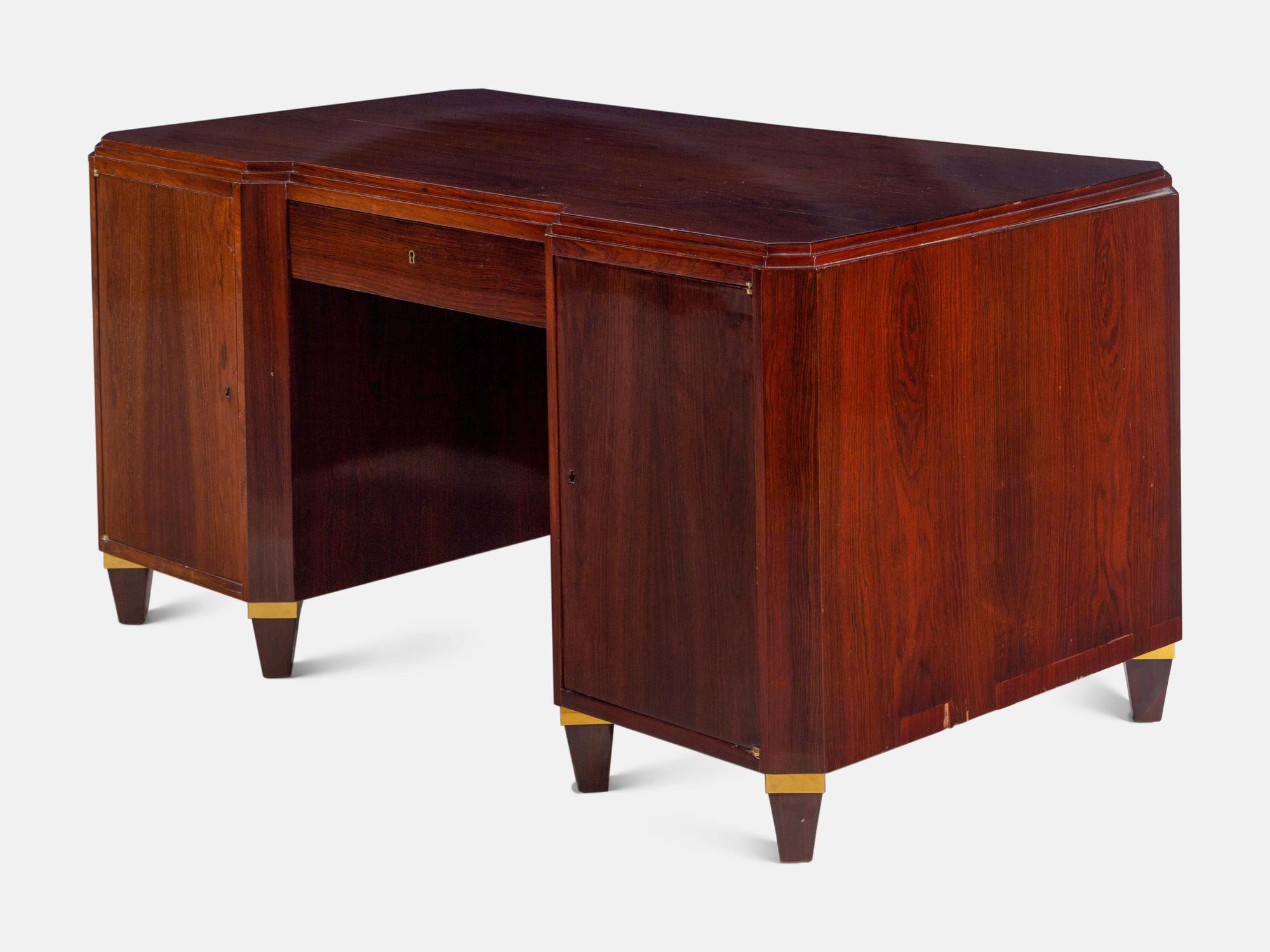 An Art Deco Lacquered Walnut and Brass Desk