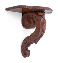 A Continental Carved Oak Bracket