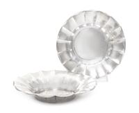 A Pair of Continental Silver Bowls, Likely German, 1920, each of shallow, circular form with fluted sides, having a spot-hammered finis