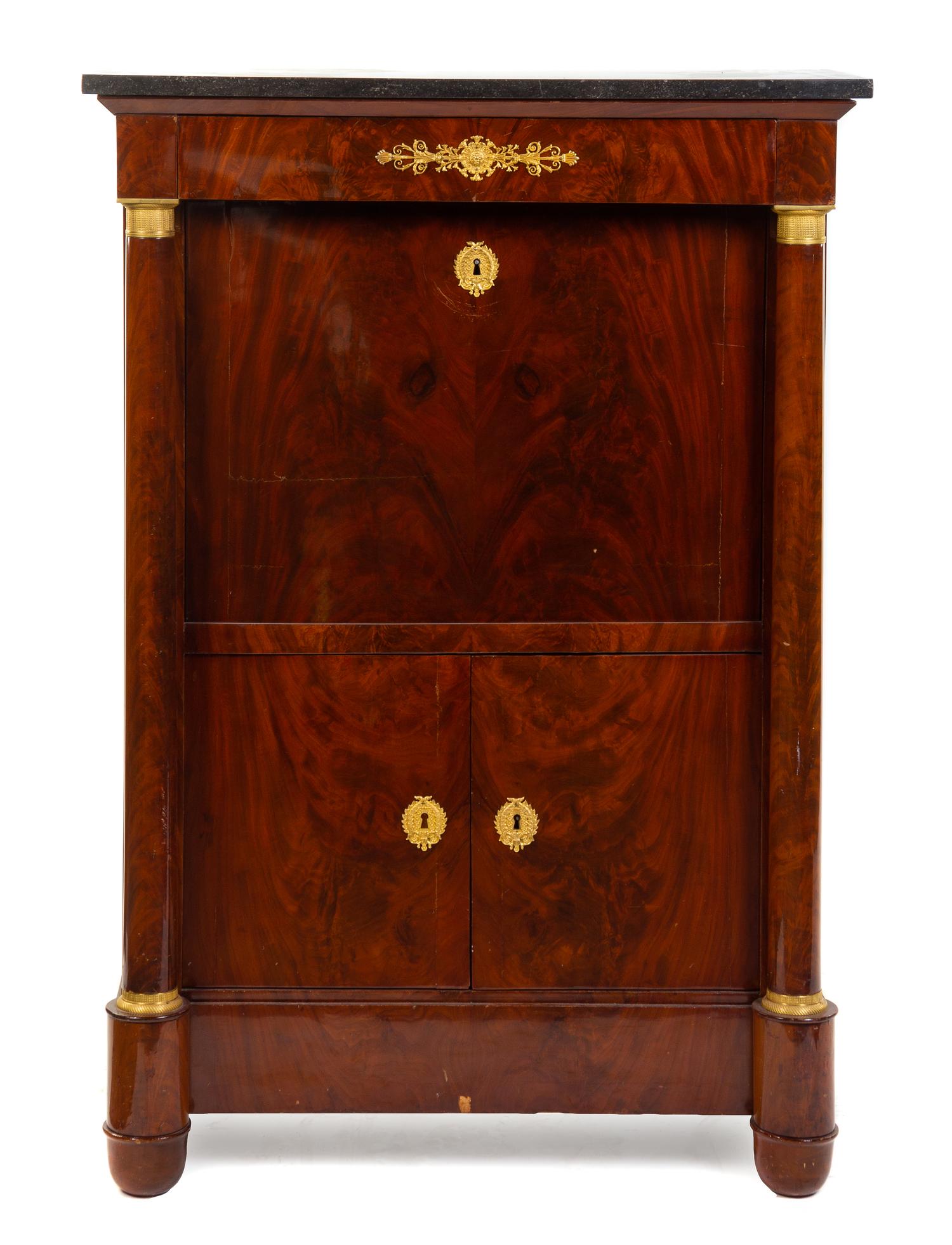 An Empire Gilt Bronze Mounted Mahogany Secretaire a Abattant Height 55 1/2 x width 38 1/2 x depth 17 5/8 inches. — EARLY 19TH CENTURY