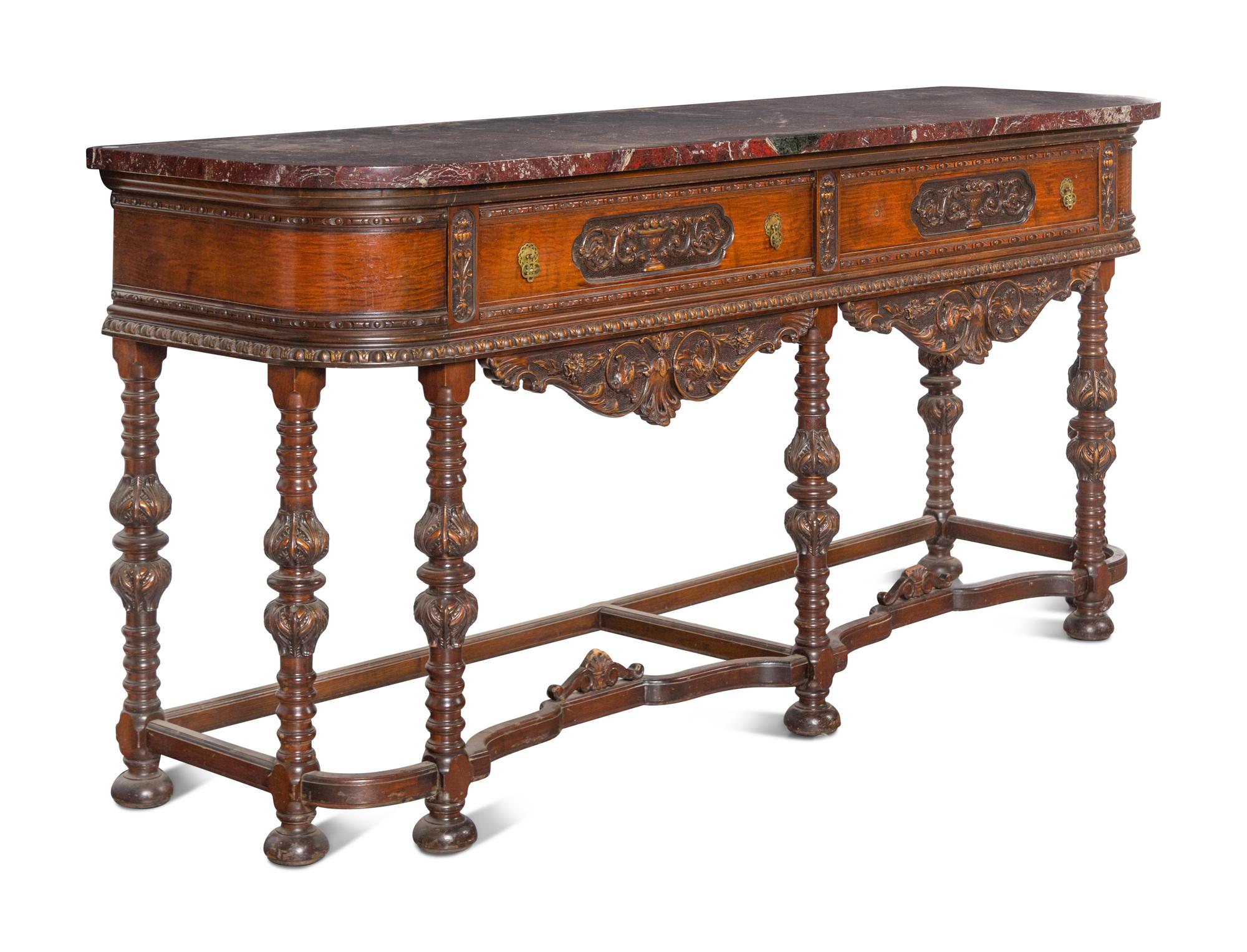 An Italian Carved Walnut Marble-Top Server