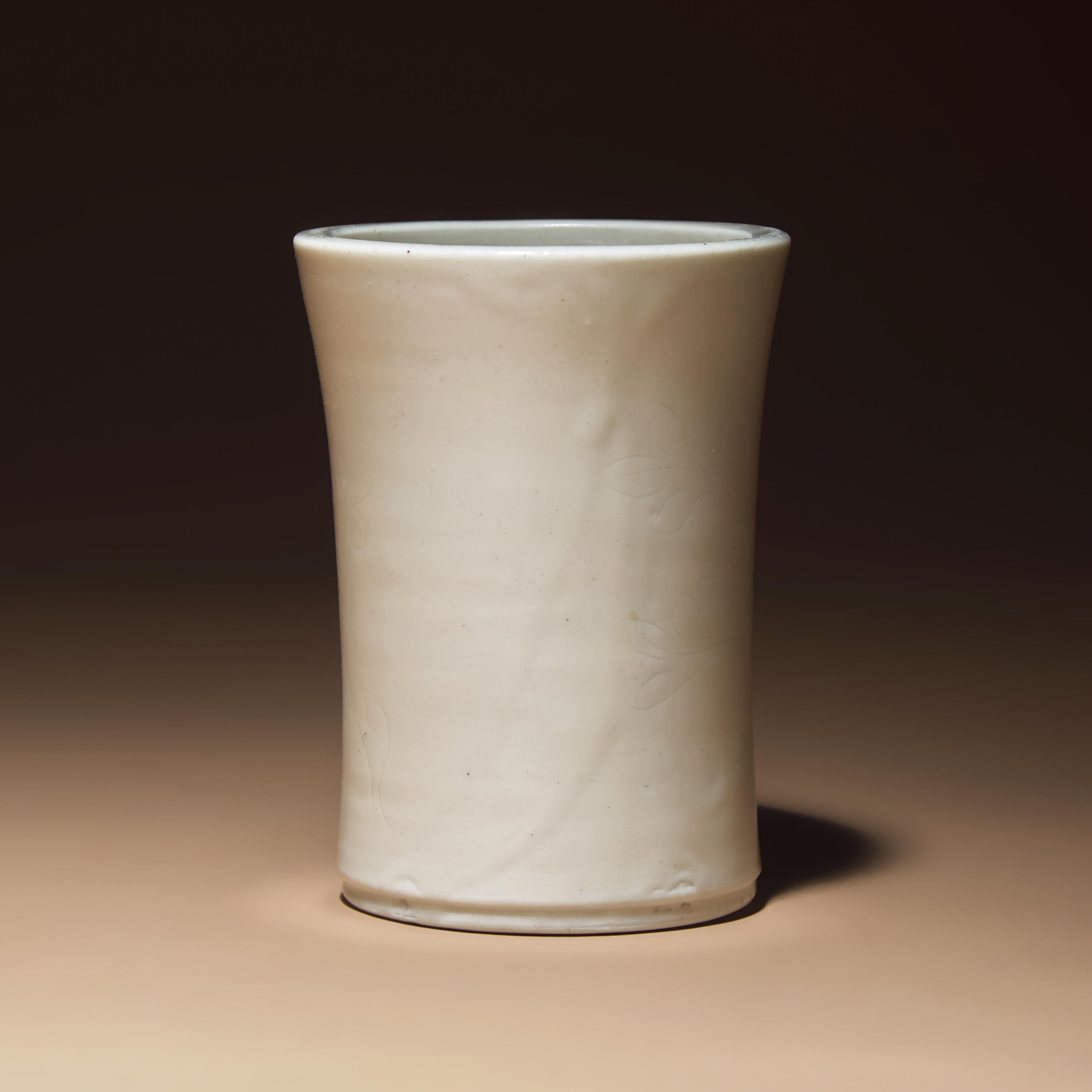 A Chinese Incised Blanc-de-Chine Porcelain Brushpot, Bitong, 17th-18th Century — 清早期 德化白瓷暗刻花卉紋筆筒