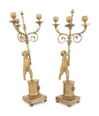 A Pair of Louis XV Style Gilt Metal Three-Light Candelabra