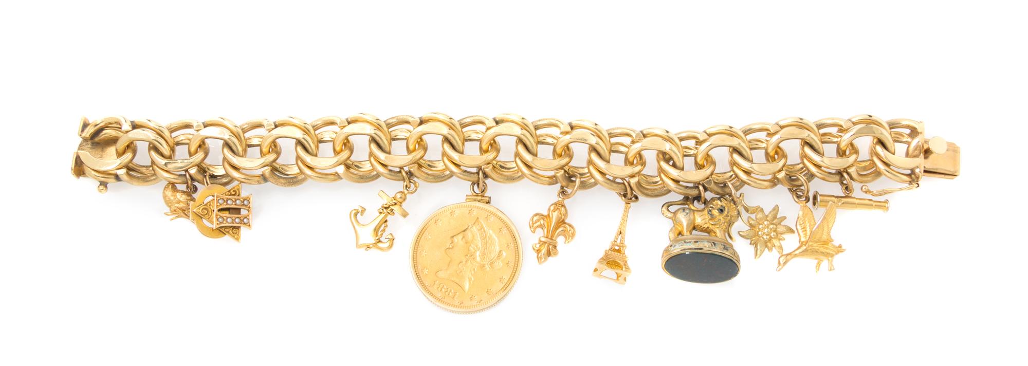 A 14 Karat Yellow Gold Charm Bracelet with Ten Charms, 96.90 dwts.