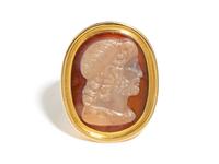 A Neoclassical Gold and Sardonyx Cameo Finger Ring with the Head of the God Zeus