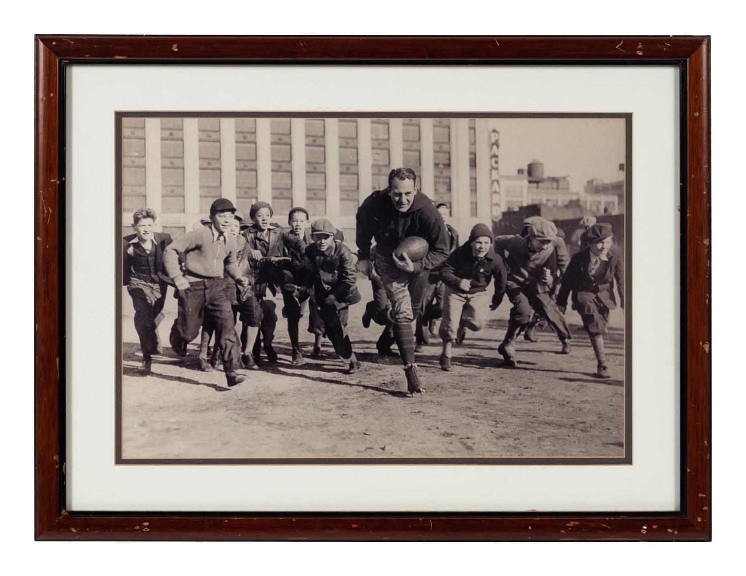 A Group of Six Early Twentieth Century Football Photographs Formerly Displayed at Mike Ditka's Restaurant