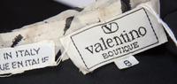 A Valentino Ivory and Black Silk Single Shoulder Gown, Size 8.