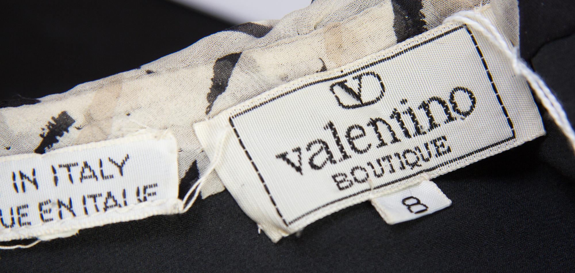 A Valentino Ivory and Black Silk Single Shoulder Gown, Size 8.