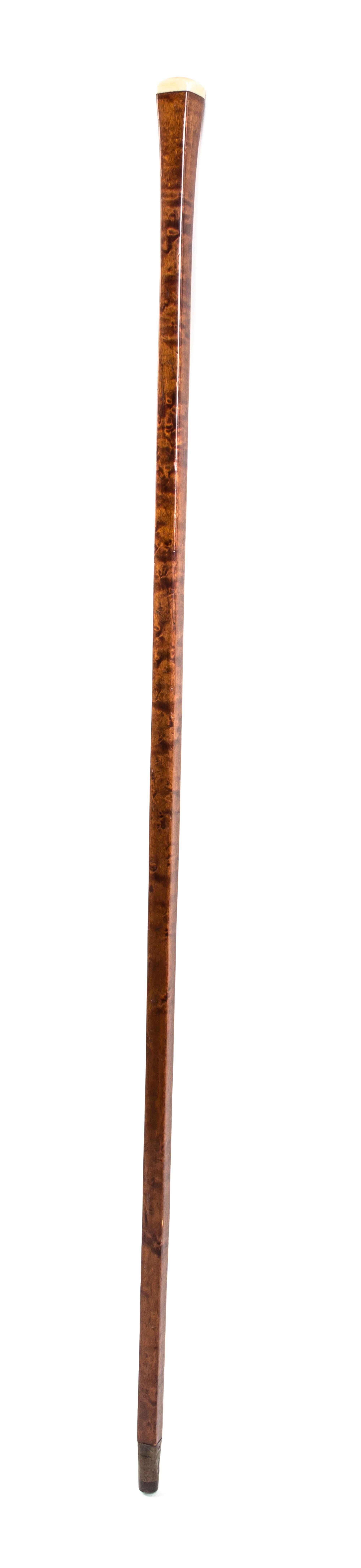 An American Ivory Handled Walking Stick, Width of handle 1 x length overall 35 3/4 inches.