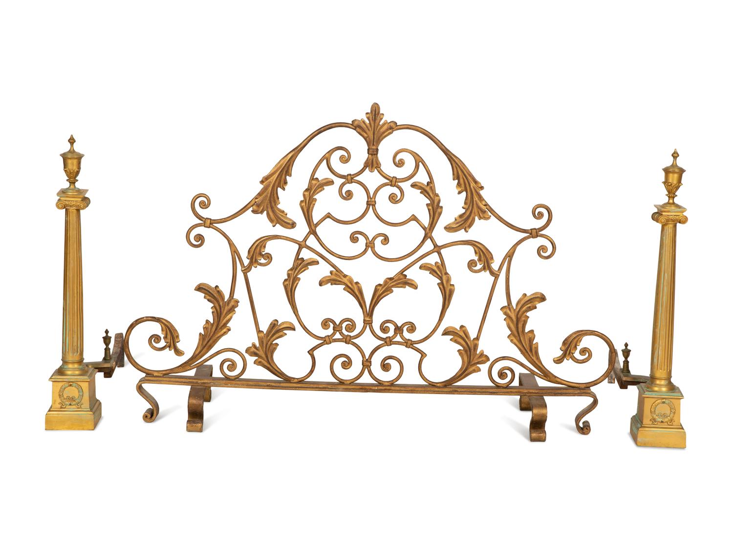 A Pair of Continental Gilt Bronze Chenets and an Associated Fire Screen