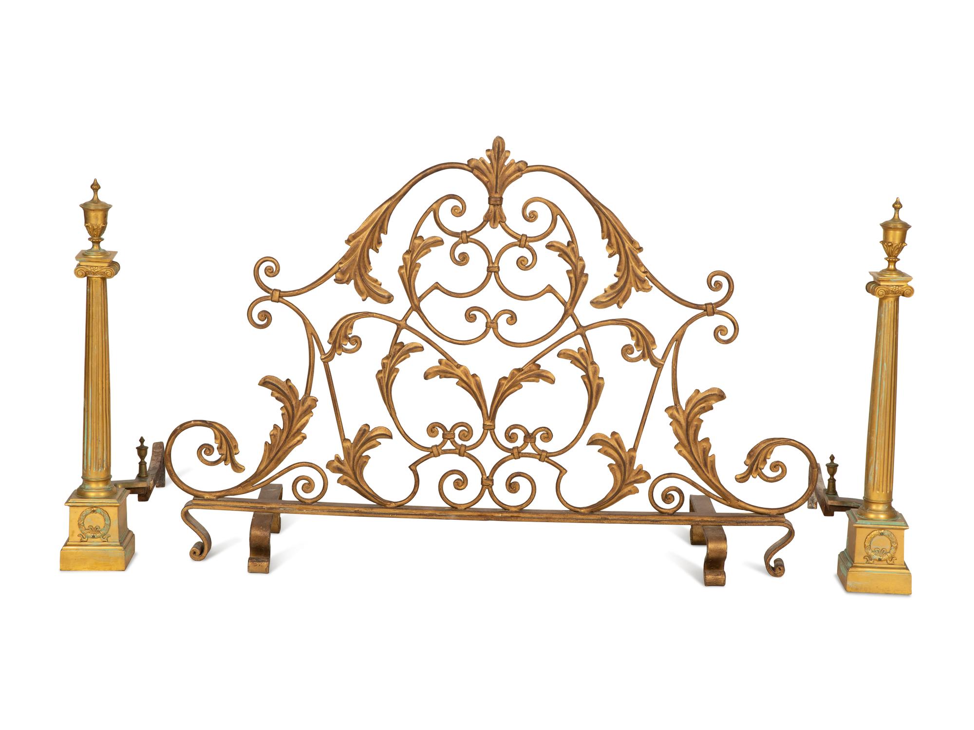 A Pair of Continental Gilt Bronze Chenets and an Associated Fire Screen