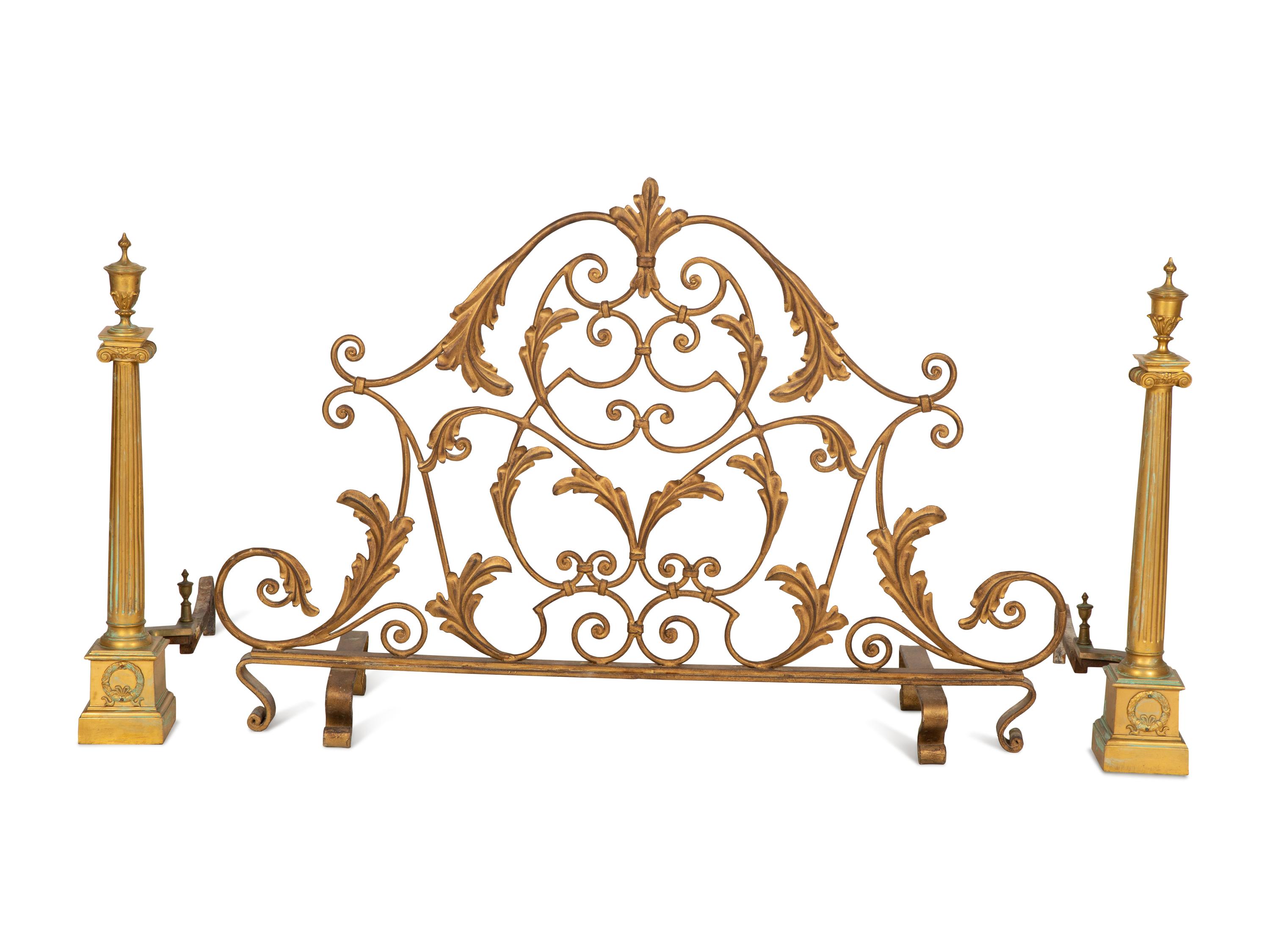 A Pair of Continental Gilt Bronze Chenets and an Associated Fire Screen