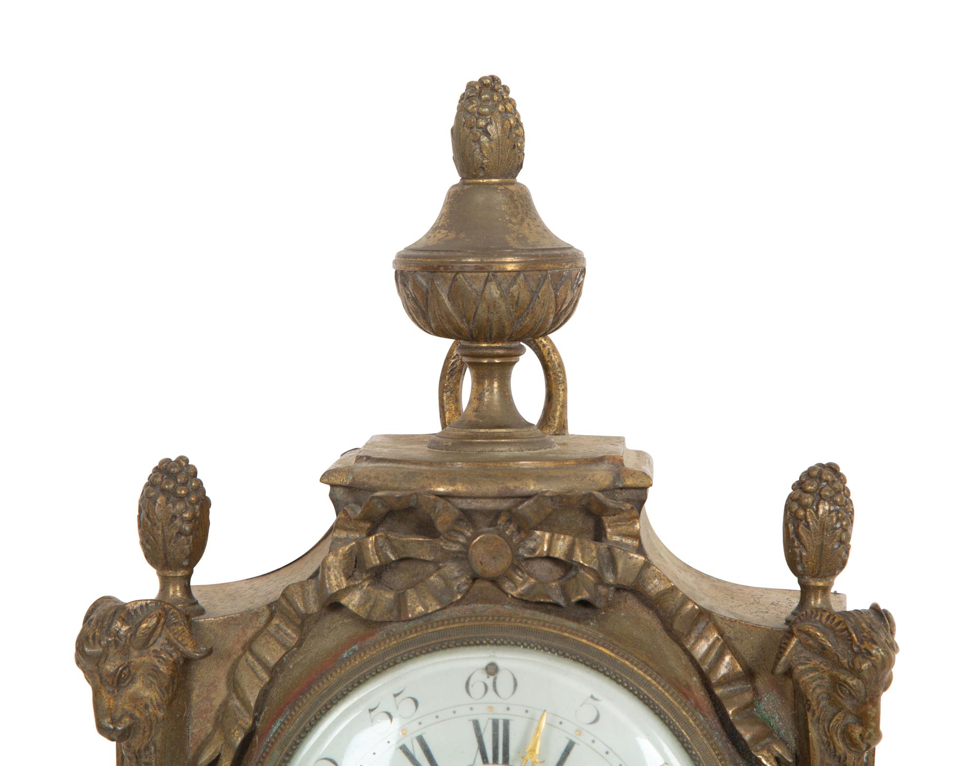 A Rango Freres Gilt Bronze Cartel Clock