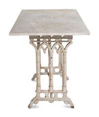 A Continental Gothic Style Painted Cast Iron Marble-Top Garden Table