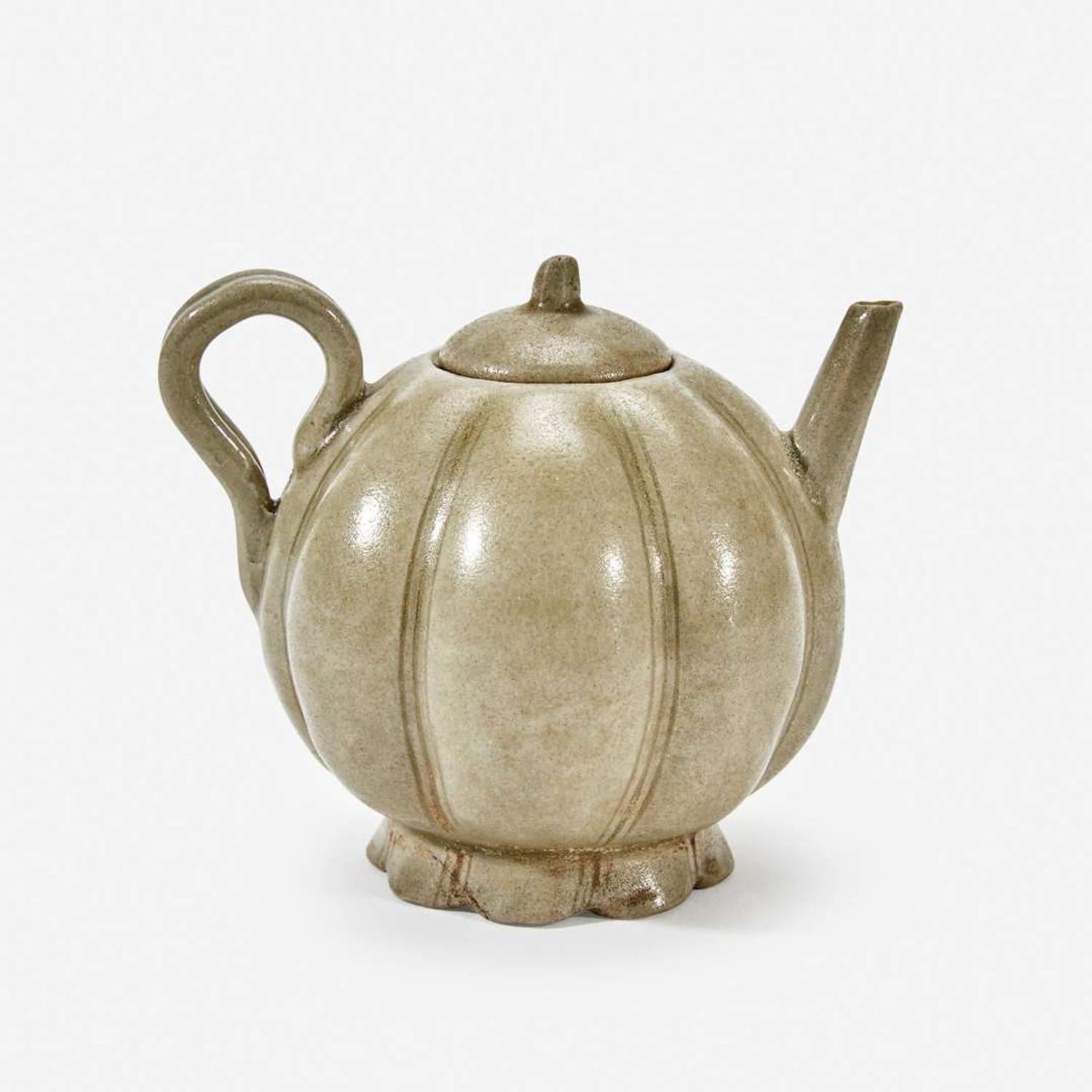 A Chinese celadon-glazed melon-form small ewer and cover Song Dynasty