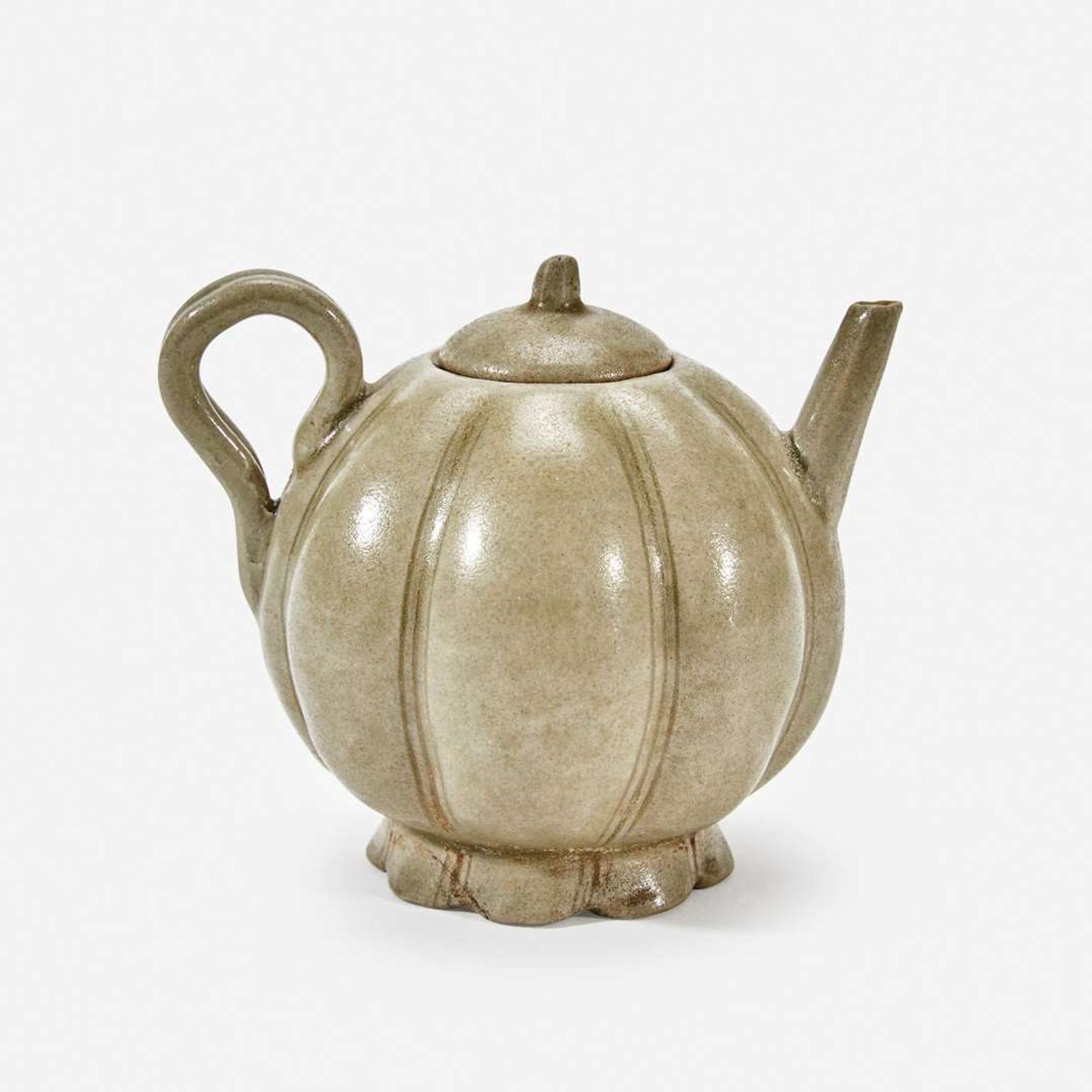 A Chinese celadon-glazed melon-form small ewer and cover Song Dynasty