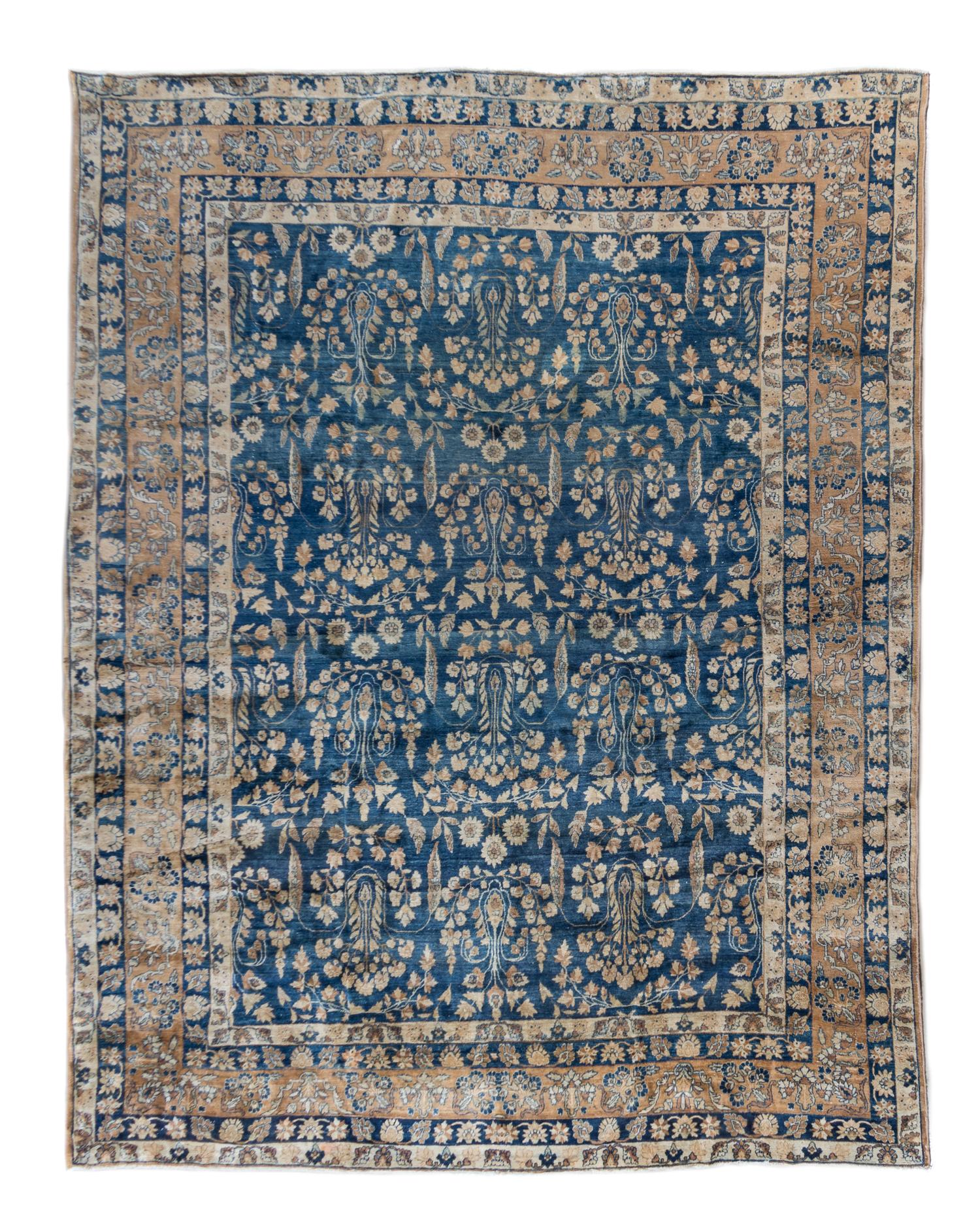 A Kirman Wool Rug 11 feet 2 inches x 9 feet.
