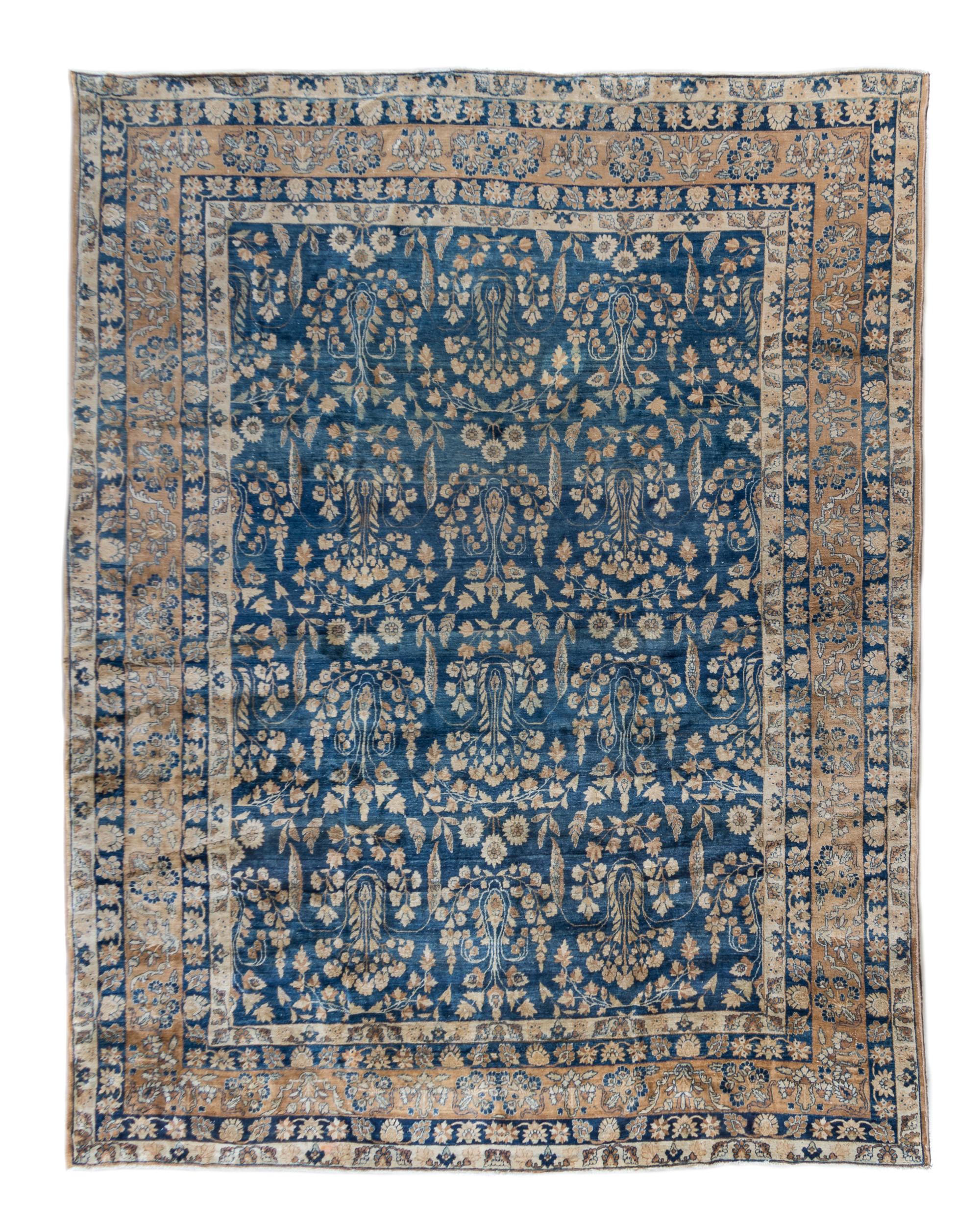A Kirman Wool Rug 11 feet 2 inches x 9 feet.